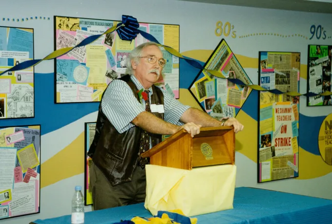 2003 - person speaking at lectern