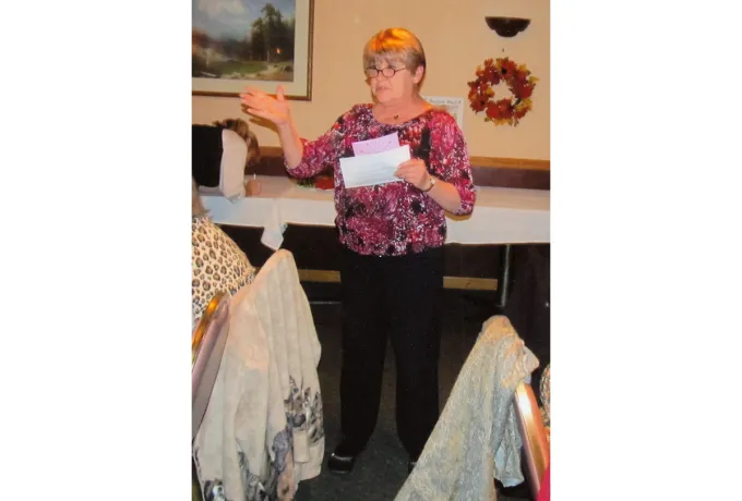 Woman speaking to people